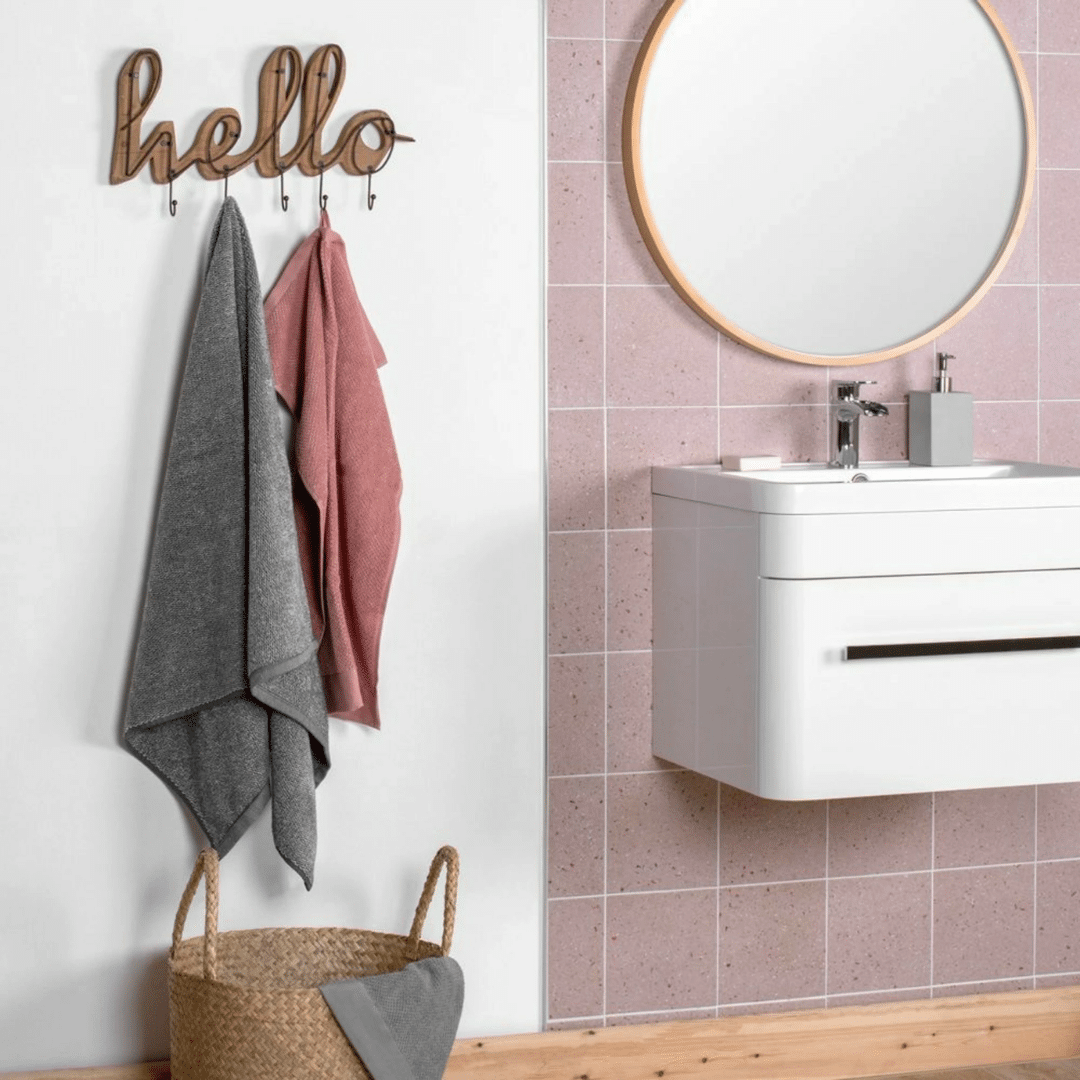 Elegant matt terrazzo porcelain tiles in gentle pink tone