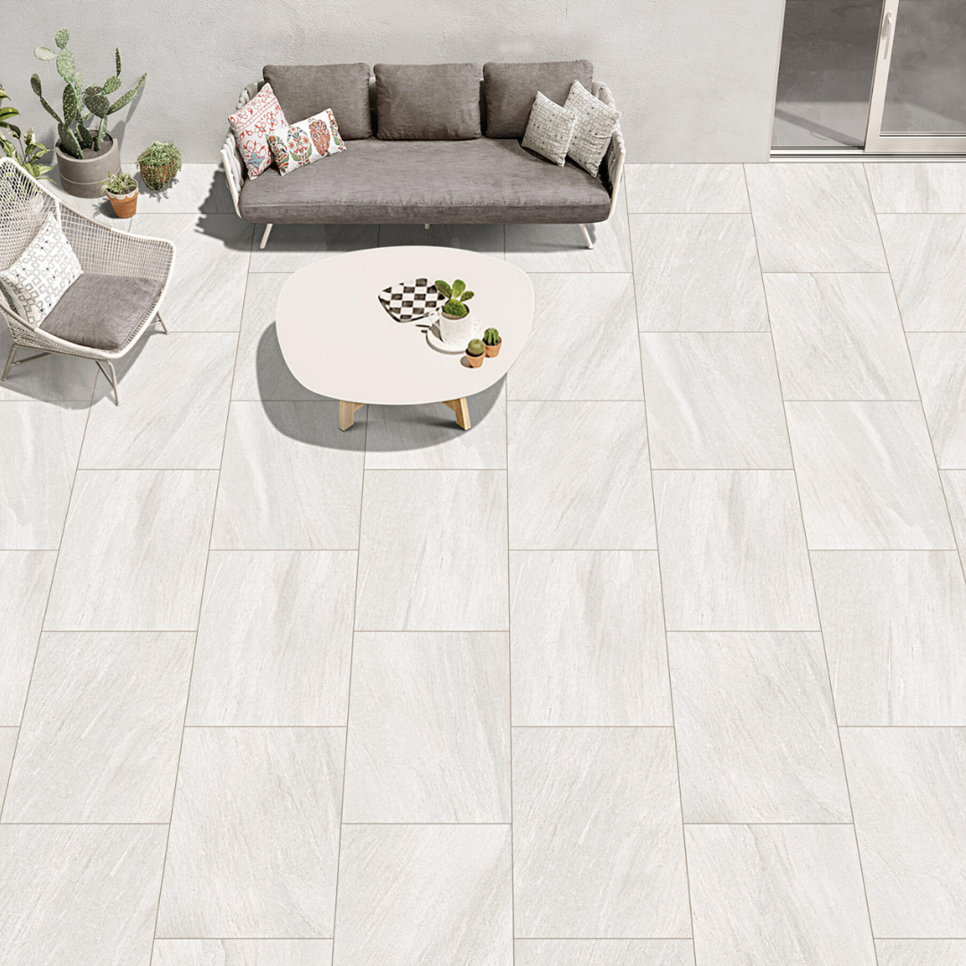 Cream porcelain paving tiles with natural stone effect