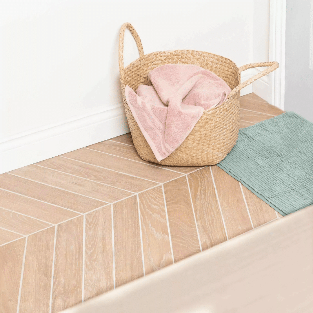 Brown porcelain tiles featuring chevron wood effect design