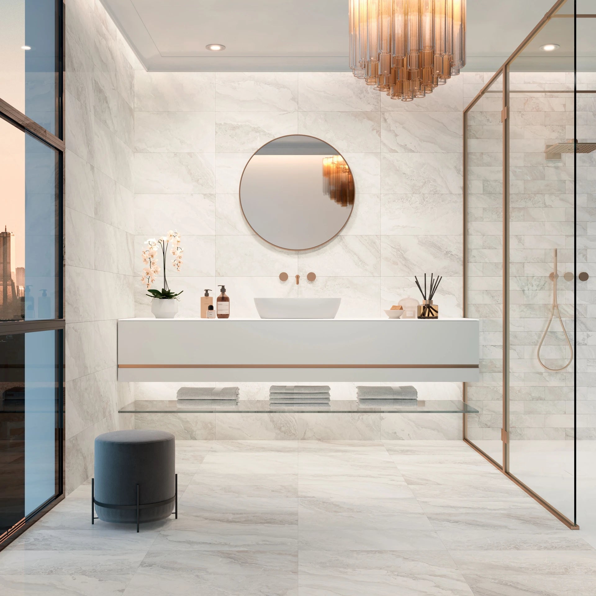 Modern bathroom with marble walls, a sink, and decorative elements.