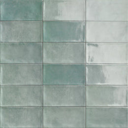 Close-up of Chiswick Emerald tile's vibrant color and glossy finish