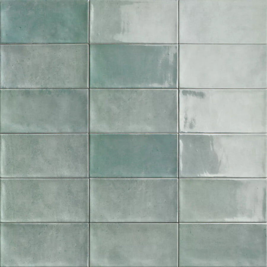 Close-up of Chiswick Emerald tile's vibrant color and glossy finish