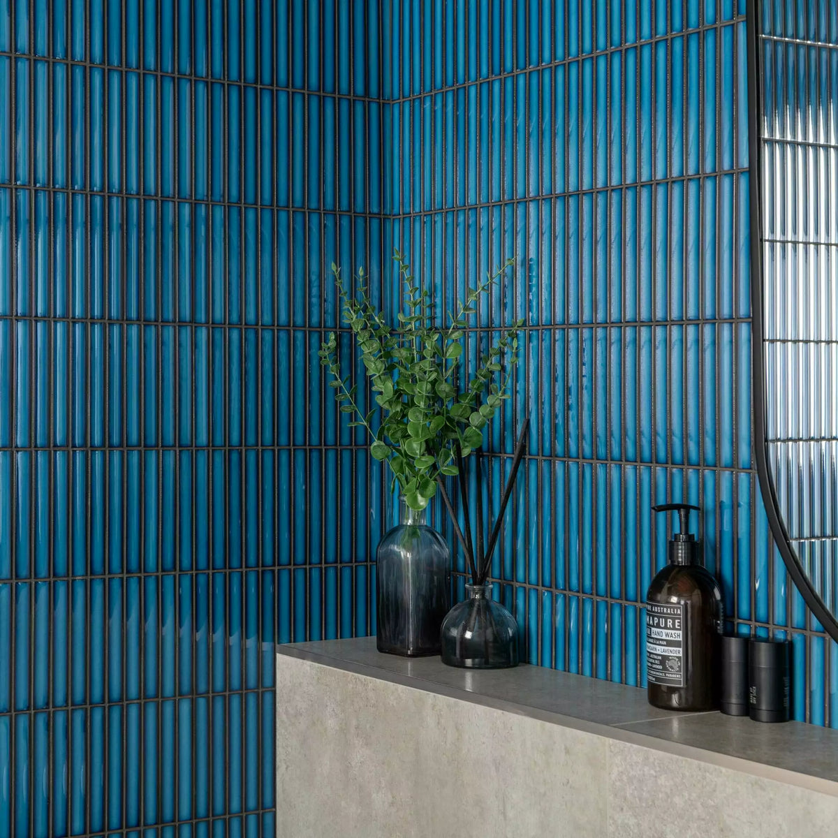 Polished porcelain mosaic tiles with bold blue design