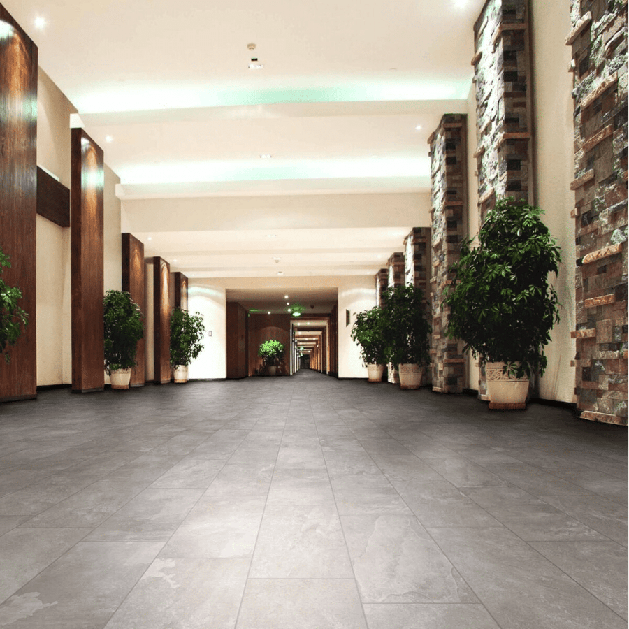 Grey stone look porcelain matt tiles for interior spaces