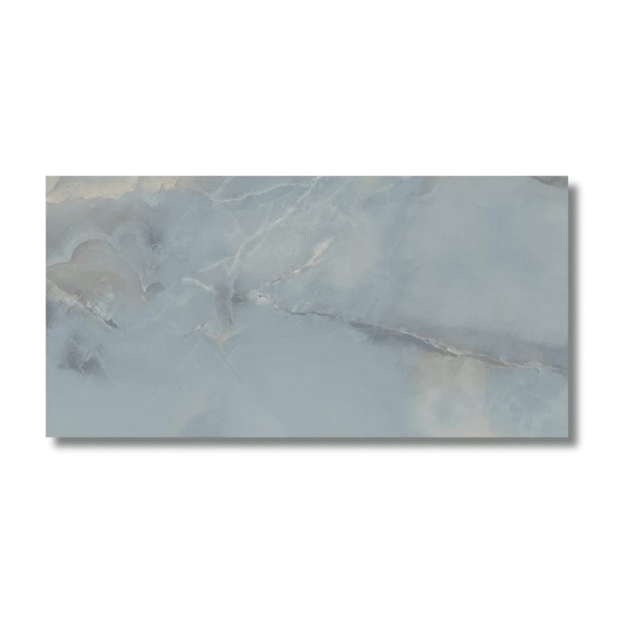 Onice Sky sky blue polished porcelain floor tile installed in spa-style bathroom