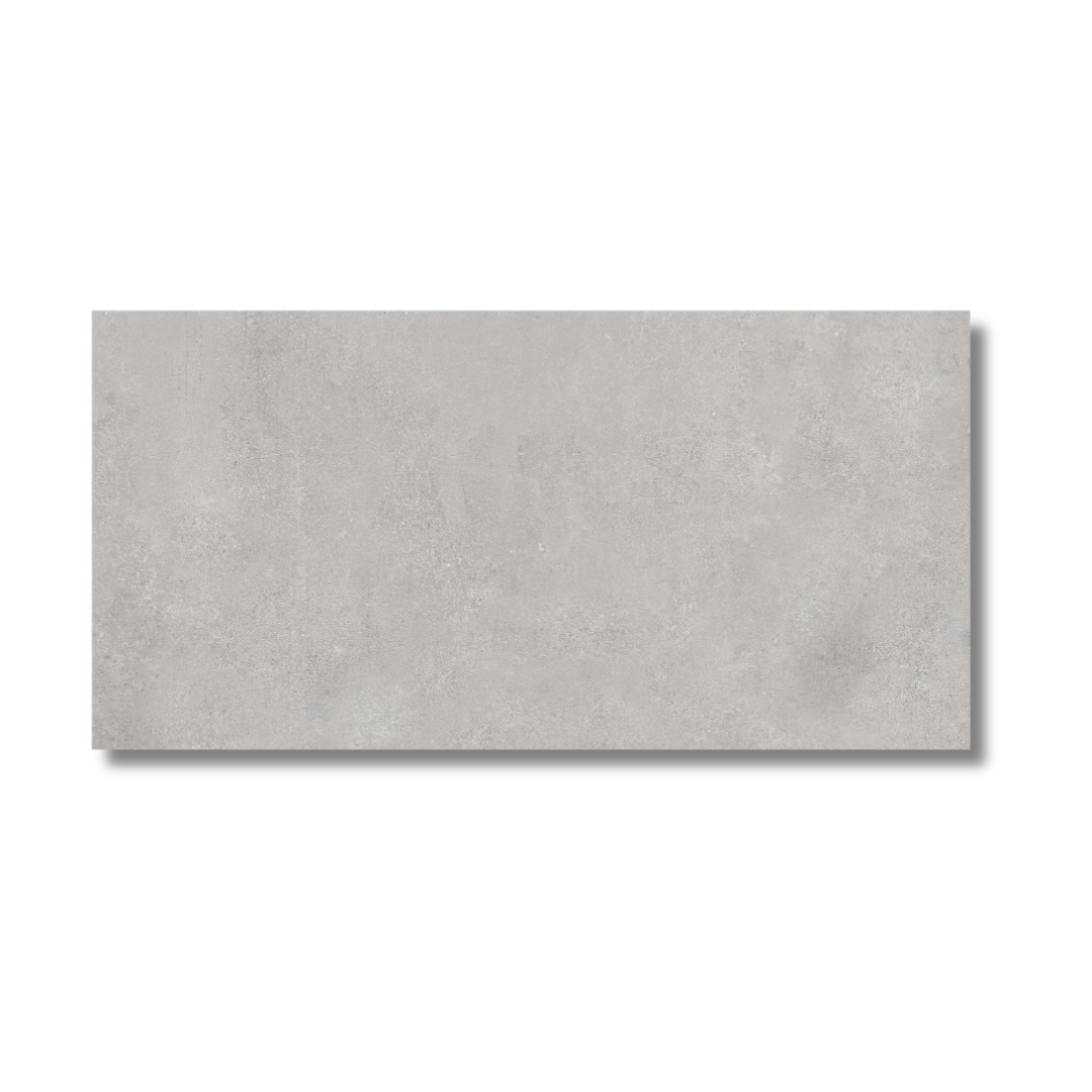 Hallway wall and floor finished with grey stone tiles