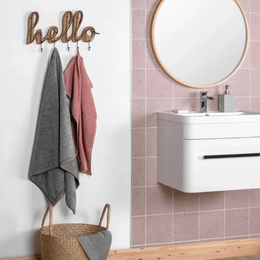 Elegant matt terrazzo porcelain tiles in gentle pink tone