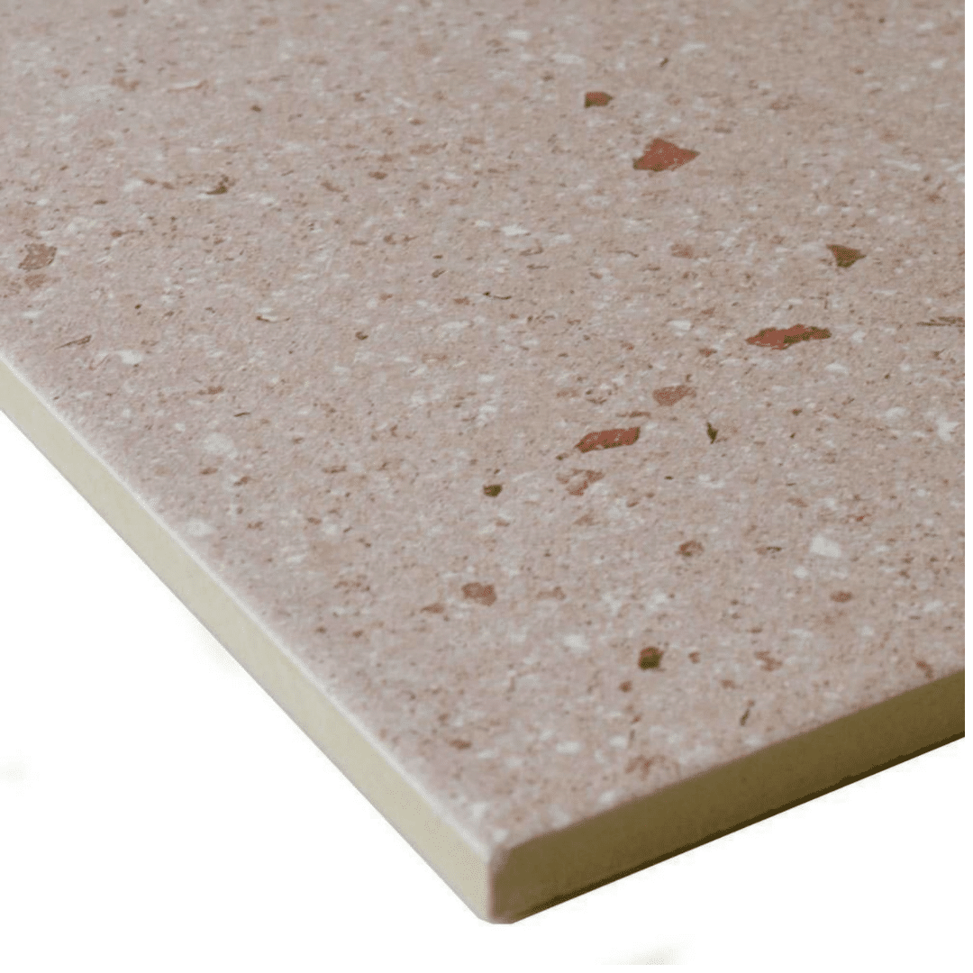 Durable terrazzo effect porcelain tiles in calm pink shade