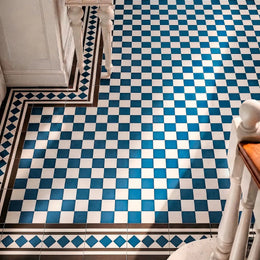 Blue and white porcelain tiles with Victorian border design