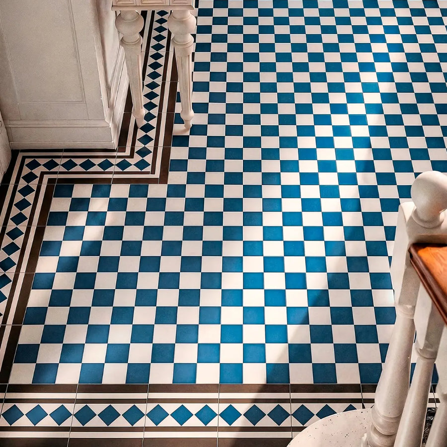 Blue and white porcelain tiles with Victorian border design