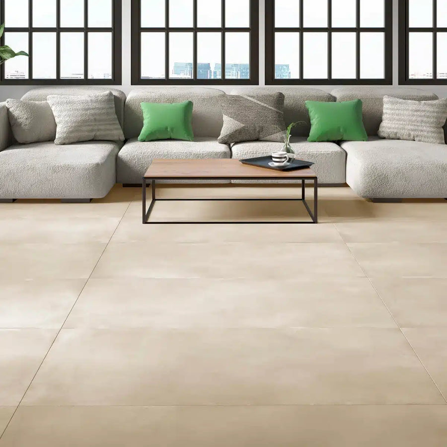 Matte porcelain tile for interiors in beige tone across open-plan living space